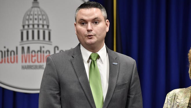 In this Monday, Feb. 5, photo, State Rep. Nick Miccarelli, R-Delaware, speaks during a joint press conference with State Rep. Margo Davidson, D-Delaware, on commonsense gun reform legislation in the Capitol Media Center. (Blaine Shahan/LNP via AP)