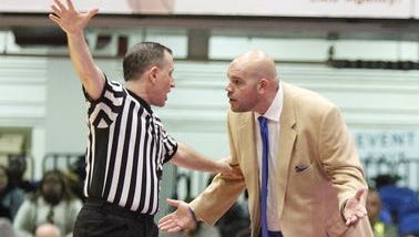 Saunders coach Anthony Nicodemo talks to an official during his team's 59-41 loss to Mount Vernon in the Class AA semifinals at the Westchester County Center in 2016.
