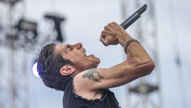 Perry Farrell performs with Jane's Addiction Friday at Indianapolis Motor Speedway.
