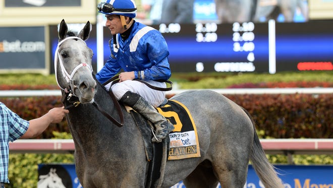 Mohaymen heads to the winner's circle after the Fountain of Youth Stakes at Gulfstream Park.