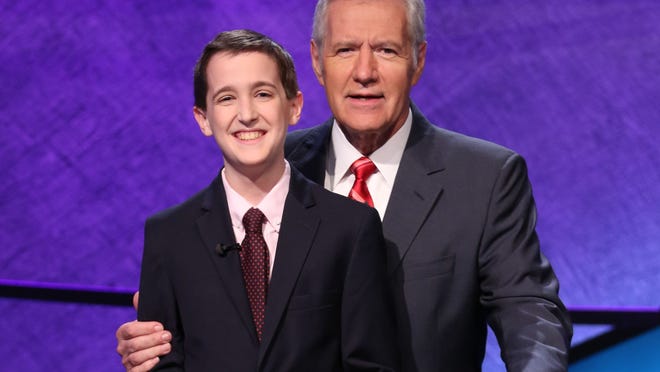 
Sam Lerner poses with Alex Trebek at the filming of Jeopardy! Teen Tournament.
