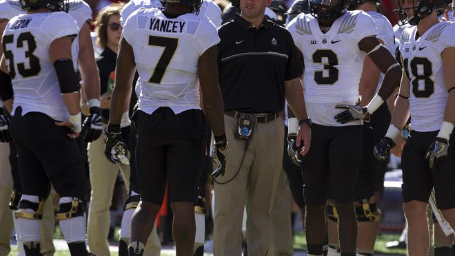 Purdue Boilermakers interim head coach Gerad Parker talks to wide receiver DeAngelo Yancey (7) during the game against the Nebraska Cornhuskers in the first half at Memorial Stadium.