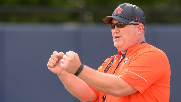 Auburn offensive line coach Herb Hand has finished