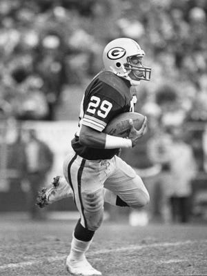 Green Bay Packers defensive back Mike C. McCoy returns a kickoff in a 21-17 victory over the Chicago Bears on Nov. 15, 1981, at Lambeau Field. McCoy died in February from complications of dementia.