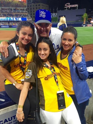 Pedro Grifol with daughters, left to right, Camila (13) and Lauren (21) and wife Ali.