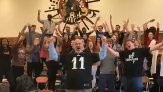 Led by Fairport High School music teacher Jim Jefferis, Fairport High School's Polyphonic Choir sing the Philadelphia Eagles' fight song.