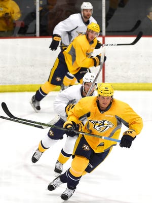  Cody Bass (16) leads the way during the Predators' first day of training camp Saturday Sept. 24, 2016, in Nashville, Tenn.