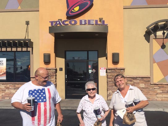 Robert, Marge and Joyce Sehnert leave a Taco Bell in