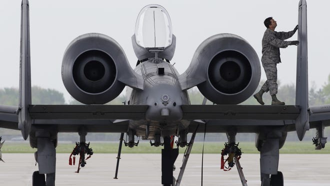 A ground crewsman prepares a A-10 Thunderbolt II from the 107th Fighter Squadron for flight at Selfridge Air National Guard Base in Harrison Township in this 2012 file photo.
