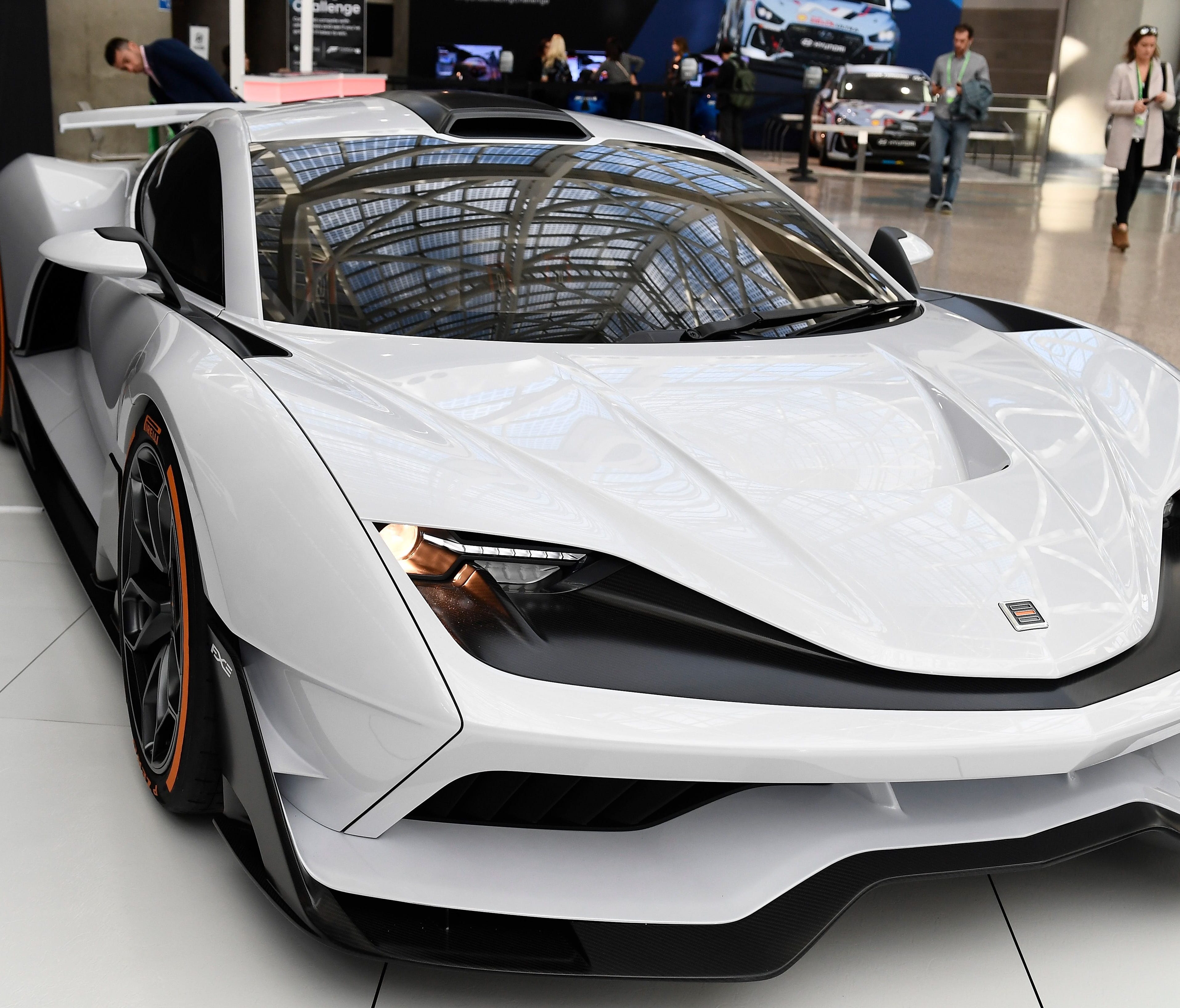 Aria Group unveiled the FXE, a mid-engine hybrid that will go 0 to 60 mph in 3.1 seconds.