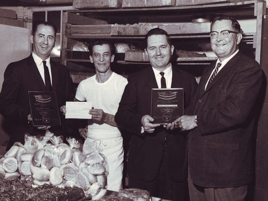 Former Distelfink owner Cecil Sandoe, second from right,