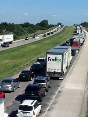 Southbound traffic was at a standstill July 30, 2015, after a motorcyclist had a wreck while texting on Interstate 65 about 40 miles northwest of Indianapolis.
