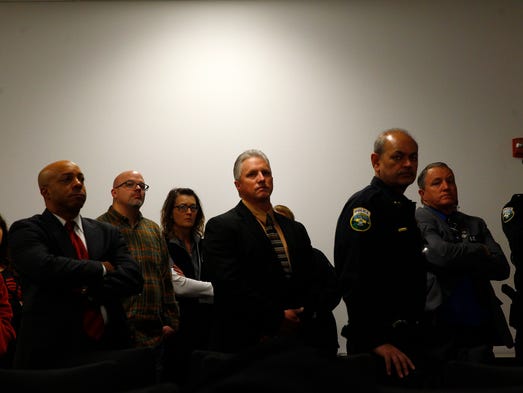 At center, Aztec Schools Superintendent Kirk Carpenter