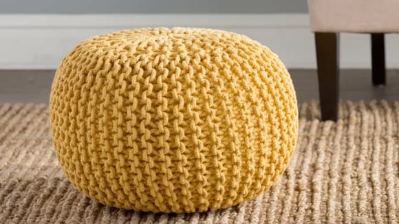 Use this pouf as a table or leg rest.