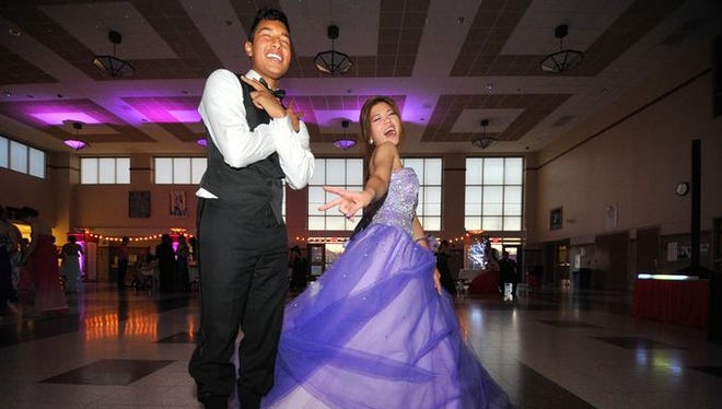 Having fun on the dance floor at Wausau East High School prom on Saturday, April 25, 2015.