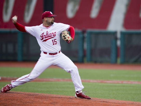Indiana's starting pitcher Pauly Milto, throws as IU