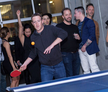 Facebook CEO Mark Zuckerberg playing ping pong at SPiN.