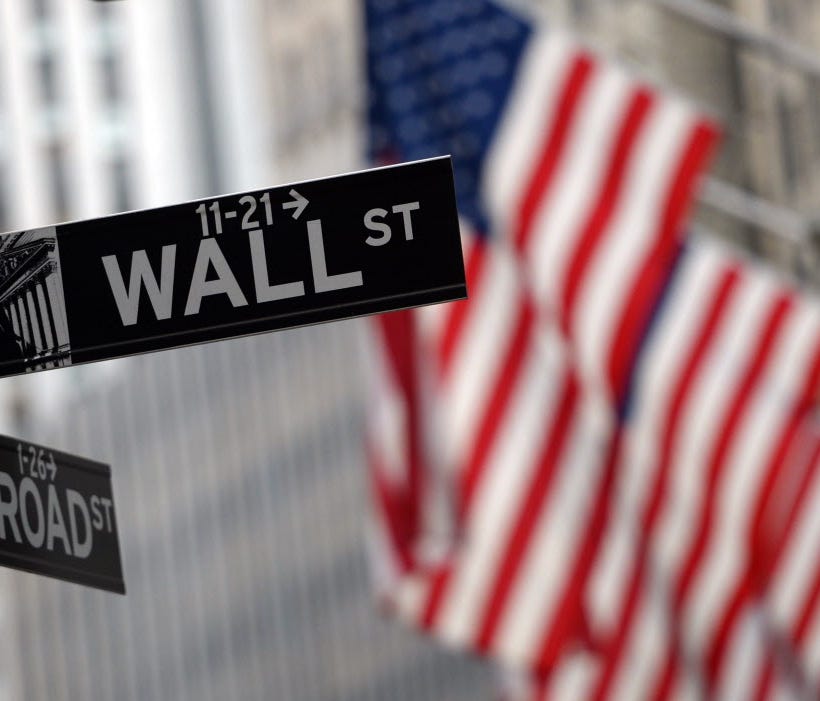 A sign at the corner of Wall and Broad Street across from the New York Stock Exchange.