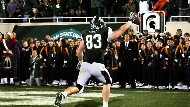 Spartan Stadium erupts and the Notre Dame band goes quiet as MSU tight end Charlie Gantt runs into the end zone for the game-winning touchdown after catching a pass from Aaron Bates in overtime on a fake field goal against Notre Dame Sept. 18, 2010.