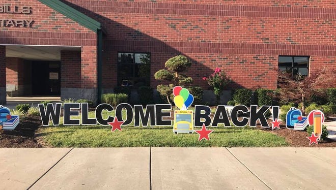 Benny Bills Elementary welcomes students on the first day of school with a festive sign.
