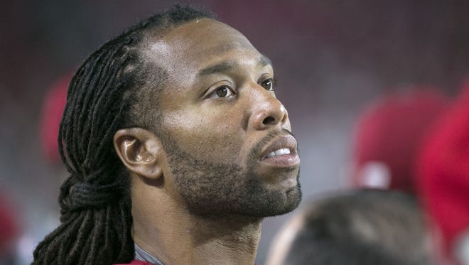 Cardinals receiver Larry Fitzgerald looks on during the fourth quarter of the preseason opener against the Raiders at University of Phoenix Stadium in Glendale on Friday, August 12, 2016.