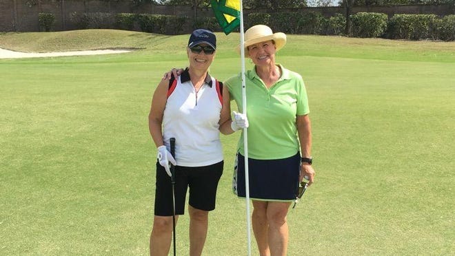 RosAnne Atkins, left, and Judy Yanachik each made a hole-in-one on No. 7 on the Whispering Oaks Course at Verandah Club in Fort Myers, Fla., on Tuesday, Feb. 28, 2017.