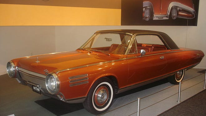 Introduced in 1963, the Chrysler Turbine Car with its jet-like gas turbine engine arrived for a unique test drive evaluation. The rear featured the novel backup light "afterburners."