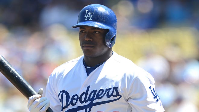 Dodgers outfielder Yasiel Puig lasted four innings before getting benched during the team's 4-0 win against the Cubs.