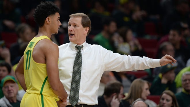 Dec 17, 2016; Portland, OR, USA; Oregon Ducks head coach Dana Altman gives forward Keith Smith (11) instructions before putting him in the game against the UNLV Runnin' Rebels  at Moda Center. The Ducks won 83-63. Mandatory Credit: Godofredo Vasquez-USA TODAY Sports
