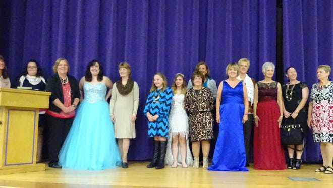 Ladies model formalwear and casual clothing at the 2014 survivor style show in Eaton, Ohio.
