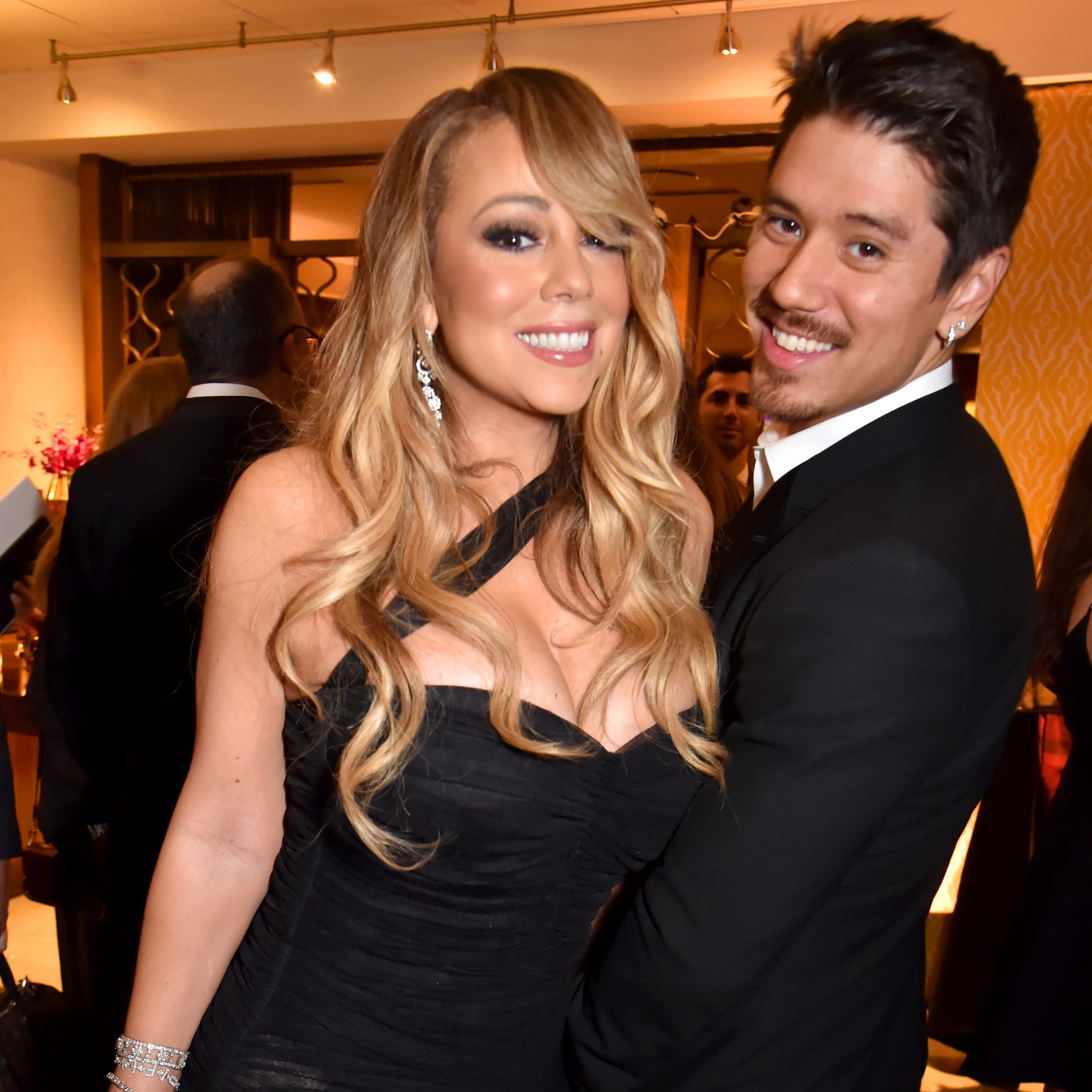 Mariah Carey and boyfriend Bryan Tanaka couple up at HBO's after party.
