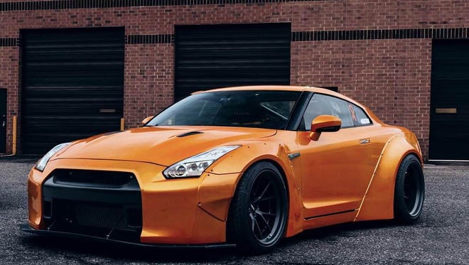 This custom Nissan GT-R will  be featured at the OC Car & Truck Show on June 11-12, 2016 at the Roland E. Powell Convention Center. The car represents the Driven to Cure charity, which raises kidney cancer awareness.