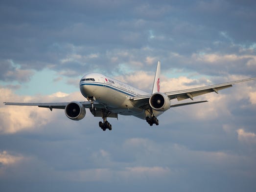 An Air China Boeing 777 nearing from Beijing prepares