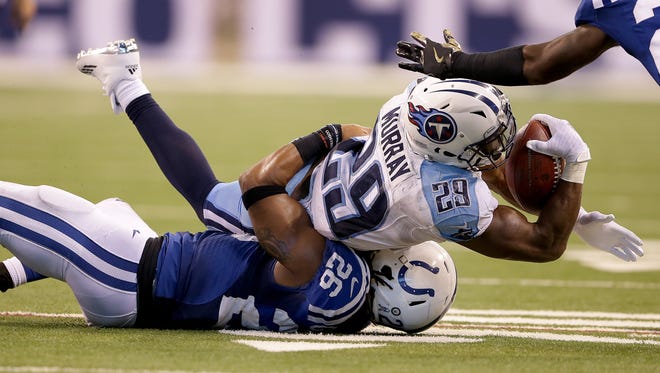Indianapolis Colts free safety Clayton Geathers (26) stops Tennessee Titans running back DeMarco Murray (29) on a 4th down play late in the fourth quarter of  their NFL football game Sunday, November 20, 206, afternoon at Lucas Oil Stadium. The Colts defeated the Titans 24-17.