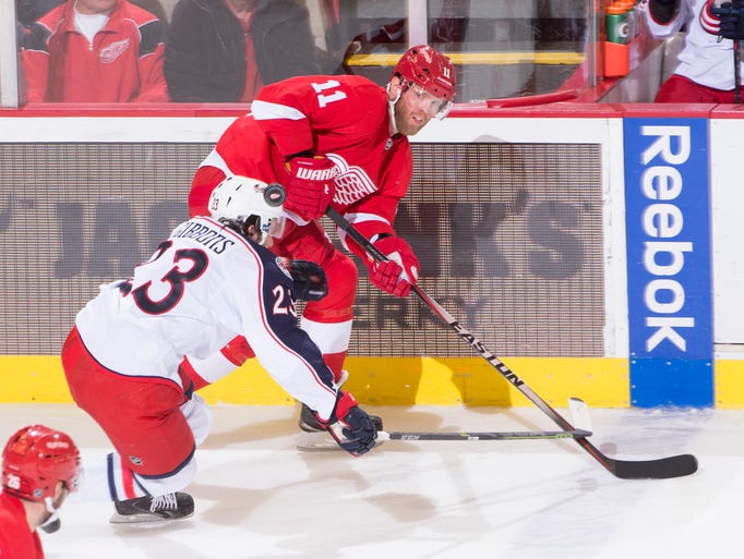 Detroit right wing Daniel Cleary and Columbus center