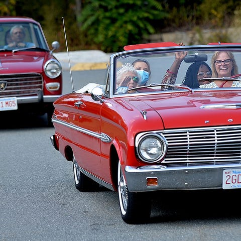 Liz Lowther of Milford leads a caravan of classic 
