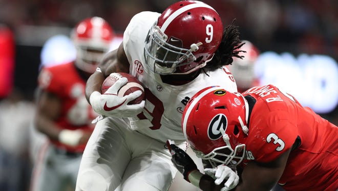 Alabama running back Bo Scarbrough voiced his disapproval of President Trump while walking out of the tunnel before Monday's national championship game.