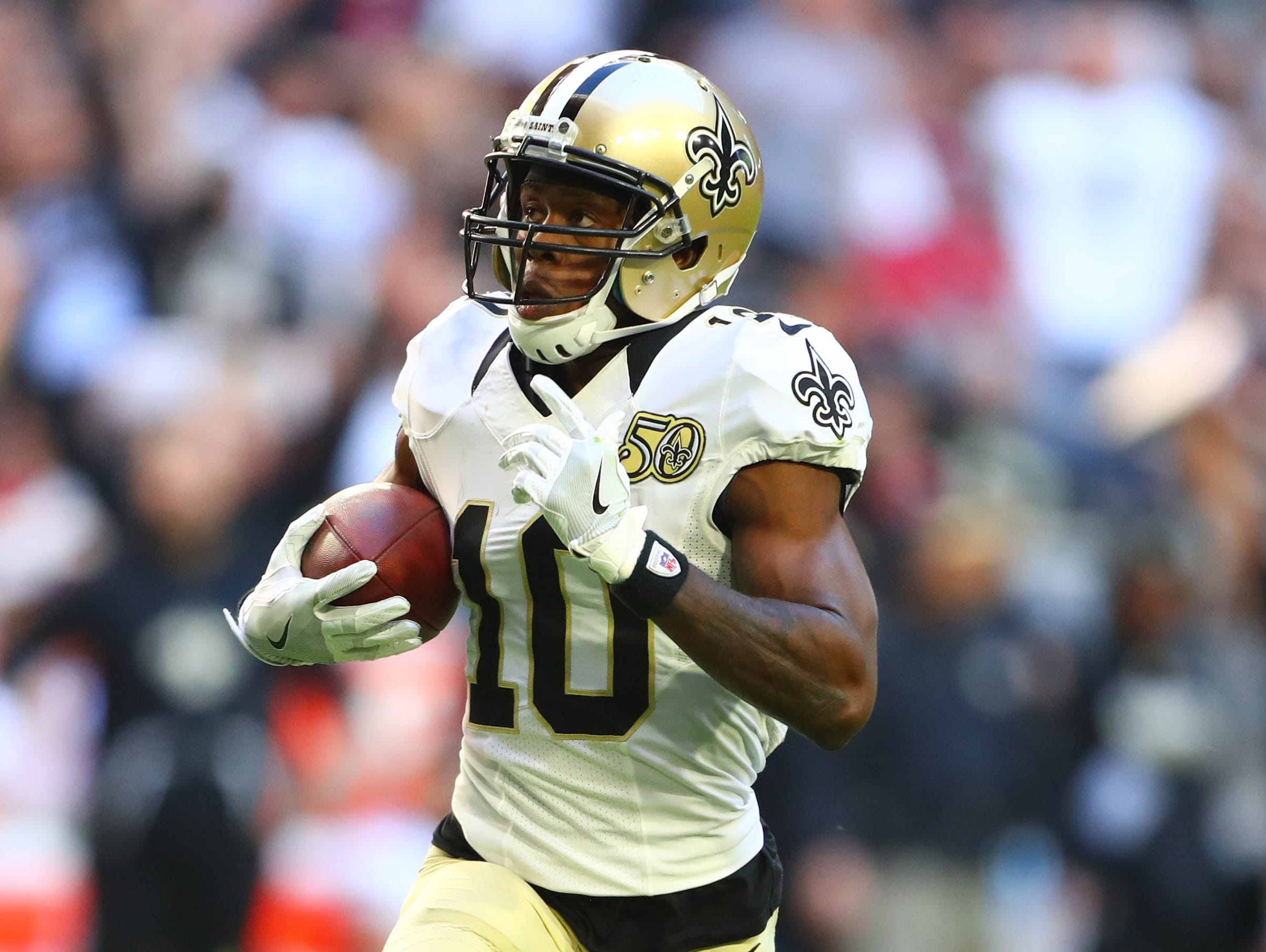 New Orleans Saints wide receiver Brandin Cooks (10) scores a second quarter touchdown against the Arizona Cardinals at University of Phoenix Stadium.
