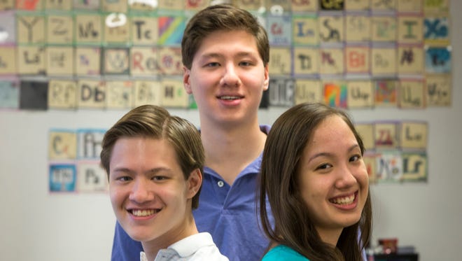 The Lee triplets — Peter (left), Stanley and Haley — will go to Brown University together.
