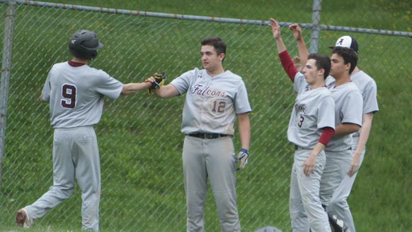 Albertus Magnus players celebrate after Mike Dunne