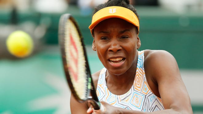 Venus Williams of the U.S. returns in her second-round match of the French Open.