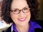 A headshot of actress Carol Ann Susi. The actress best