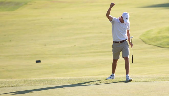 Drake Hull reacts as his birdie putt drops on the 72nd hole to win the 2018 Vermont Amateur at the Country Club of Vermont on Thursday in Waterbury. 