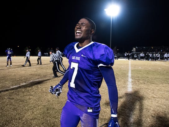 Cane Ridge's Jarad McCray (7) reacts after their Class
