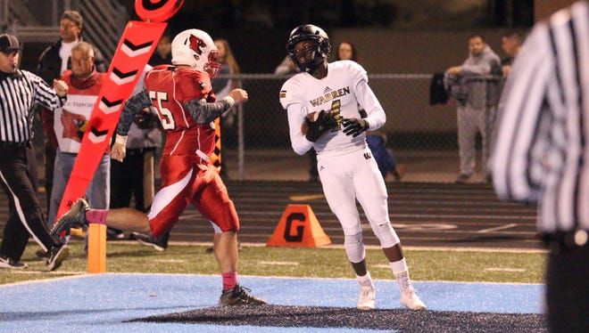 Warren Central WR David Bell (right) scored three times against Southport on Friday night.