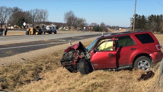A local woman was injured Friday afternoon when her SUV struck the rear of a Caterpillar tractor in the northbound lanes of Ind. 3 south of Muncie.