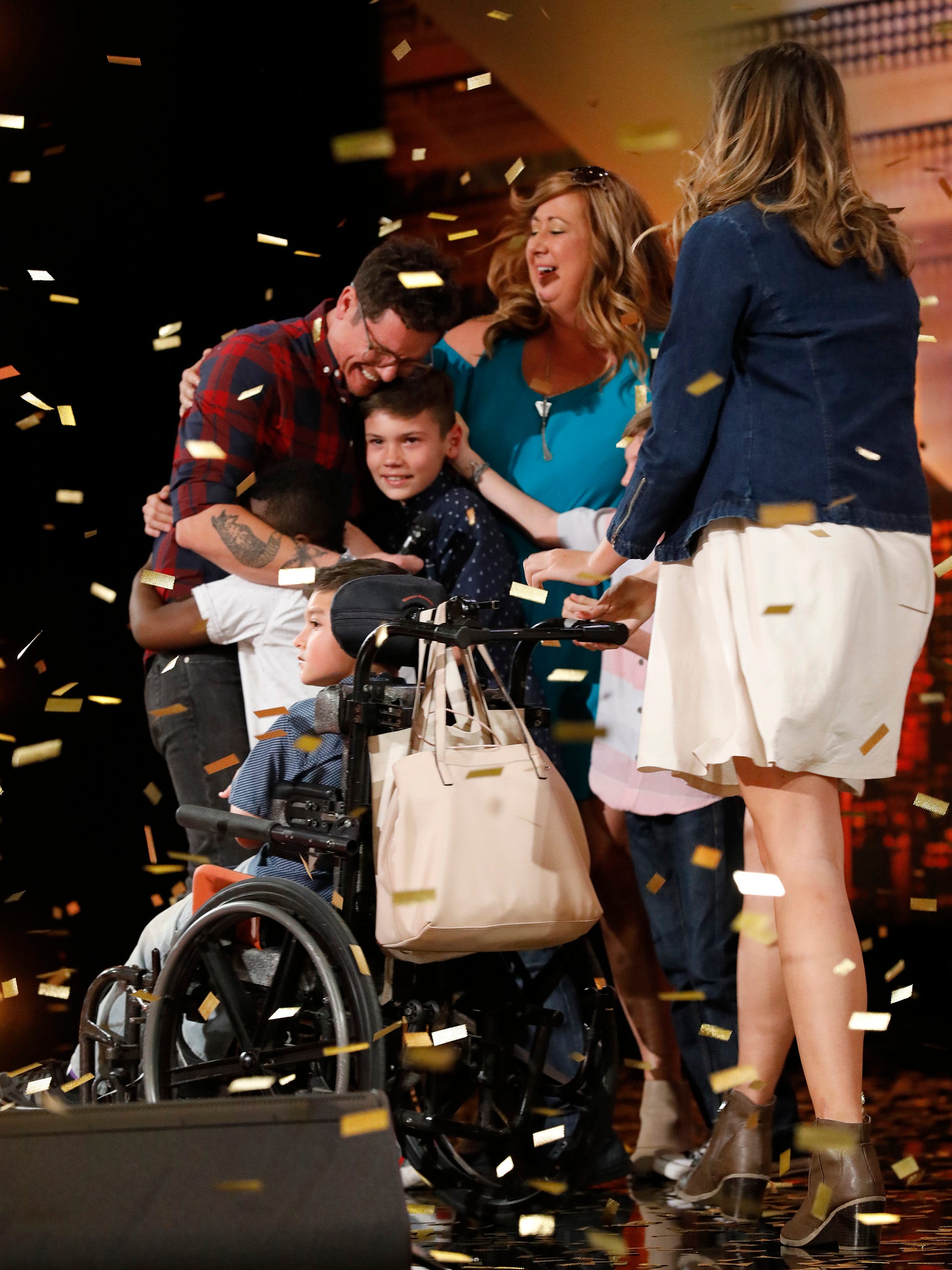 Knoxville's Michael Ketterer embraces his family after auditioning for "America's Got Talent" on Tuesday, June 5, 2018. He earned the show's Golden Buzzer from Simon Cowell, which will advance him to the "AGT" live shows.