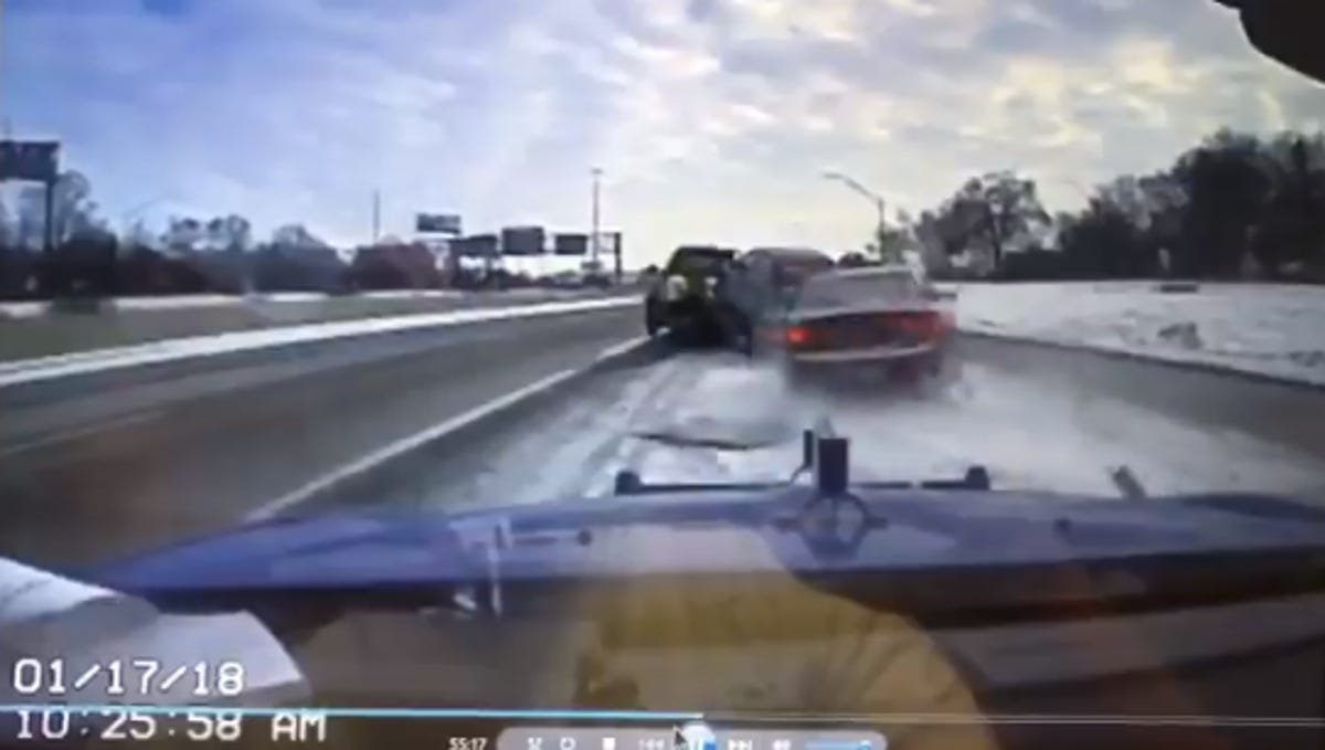 Caught On Video Man Narrowly Escapes Sliding Car In I 96 Crash