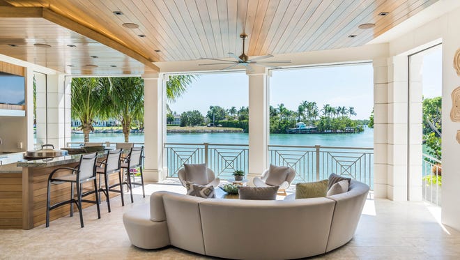 Views from the outdoor area of 4395 Gordon Drive include Cutlass Cove and the mangroves on Keewaydin Island.