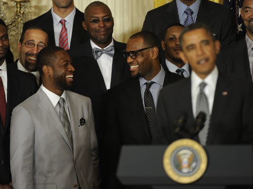 Dwyane Wade and LeBron James laugh and enjoy the moment